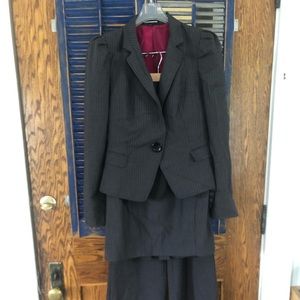 Women’s suit with jacket, pencil skirt, and pants.